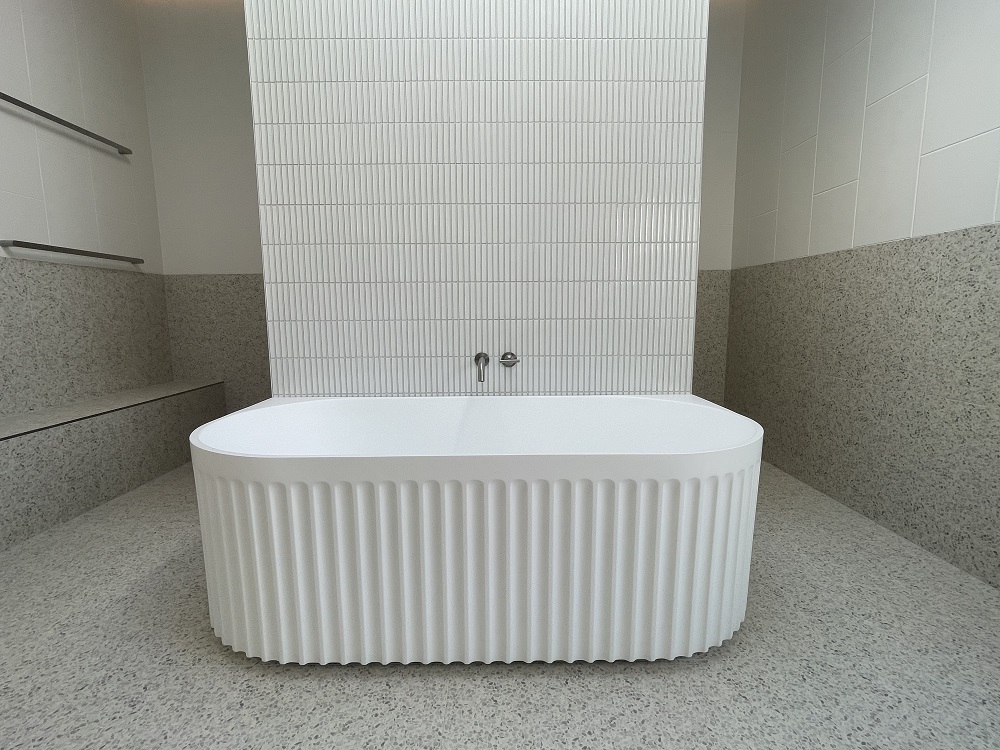 A beautifully renovated bathroom showcasing modern design elements.